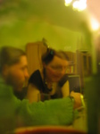 25040 Brad and Laura through wine bottle.jpg